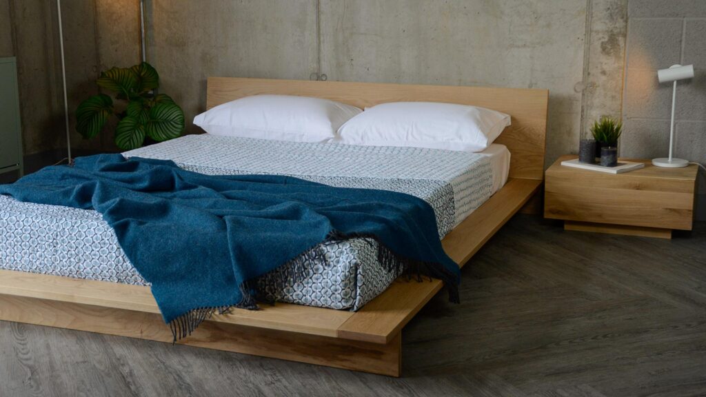 waltons blue and white printed blue pattern bedspread on oak regon boho look