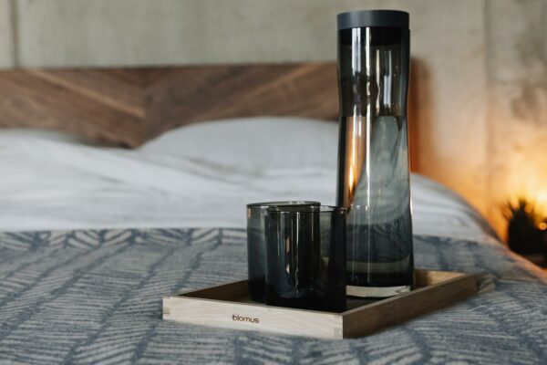 wooden tray with smoke glass carafe and glasses