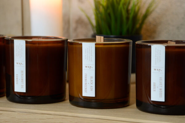 woodwick candles in amber glass close up